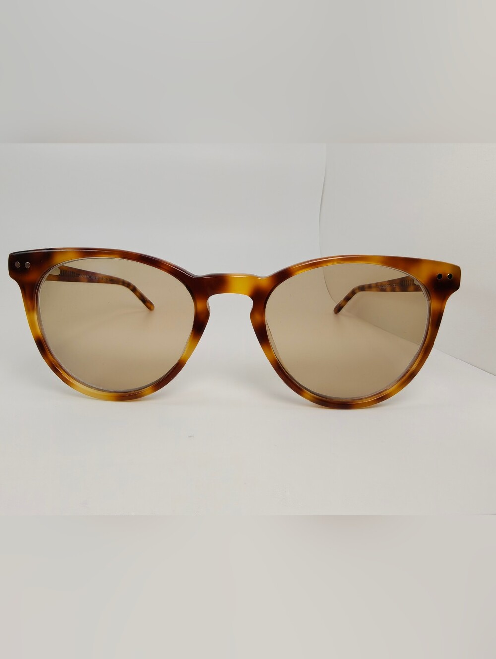 Notting Hill. Feminine. Tortoiseshell Round. Slight Cat Eye Shape.